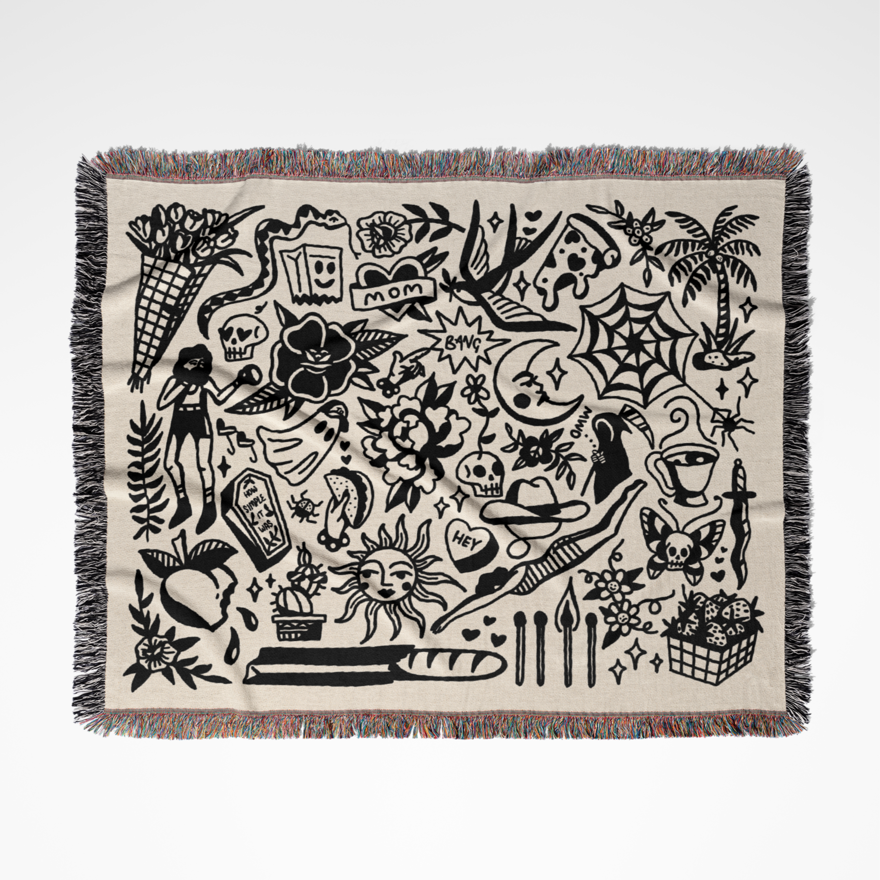 Woven blanket with black graphics on a white background